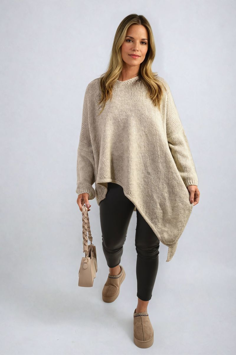 Front View: "Asymmetric Oversized Knitted Jumper in soft knit fabric, showcasing a relaxed and trendy fit."