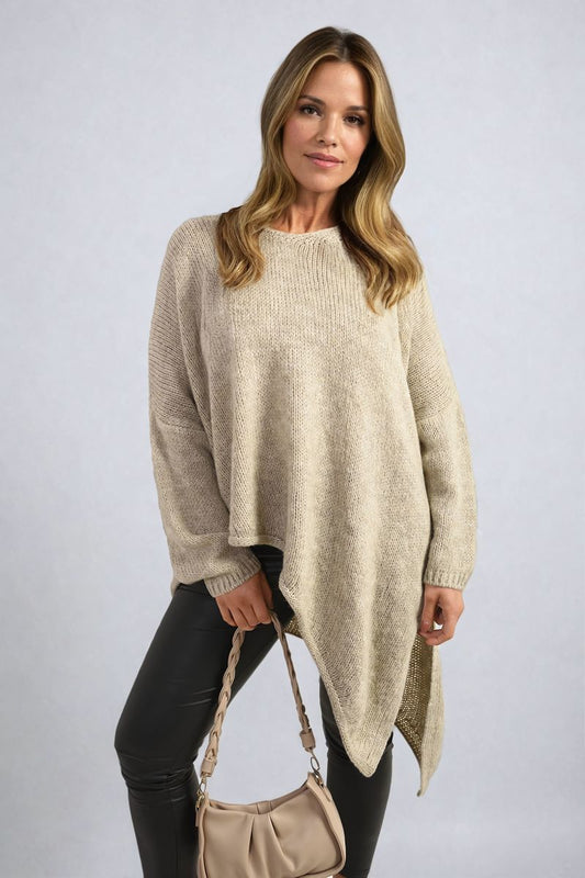 Front View: "Asymmetric Oversized Knitted Jumper in soft knit fabric, showcasing a relaxed and trendy fit."