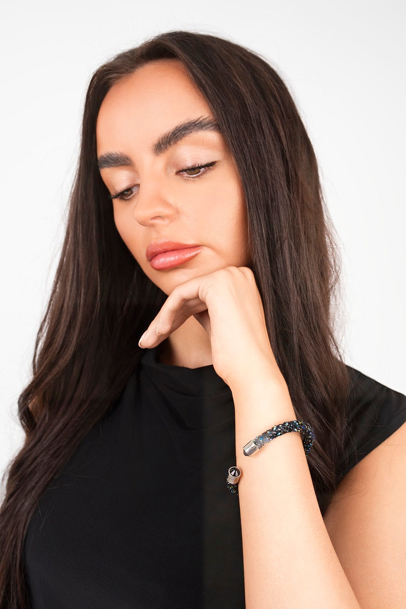 Crystal twist open-cuff bracelet with dark rhinestone sparkle and open cuff