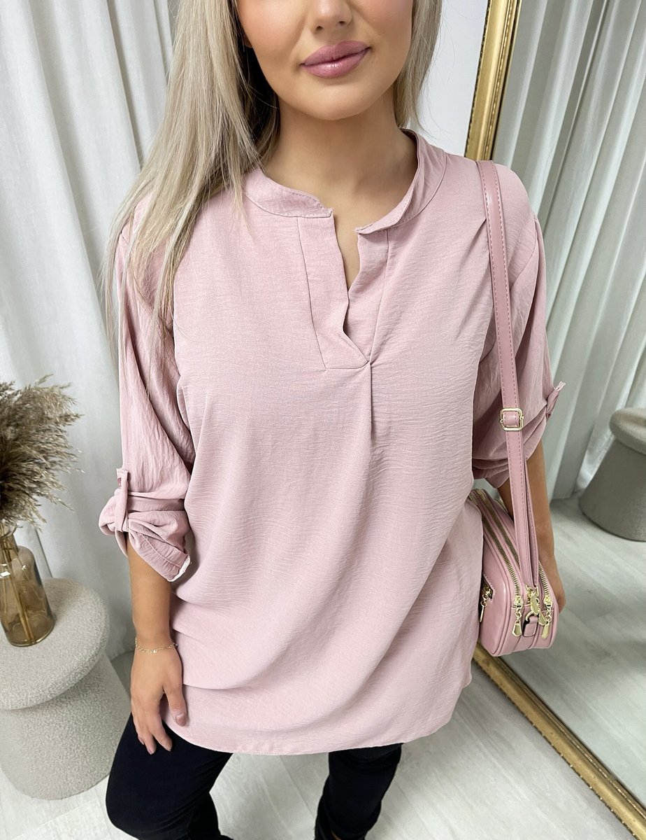 Loose-fit tunic top in pink with split neckline and front button placket