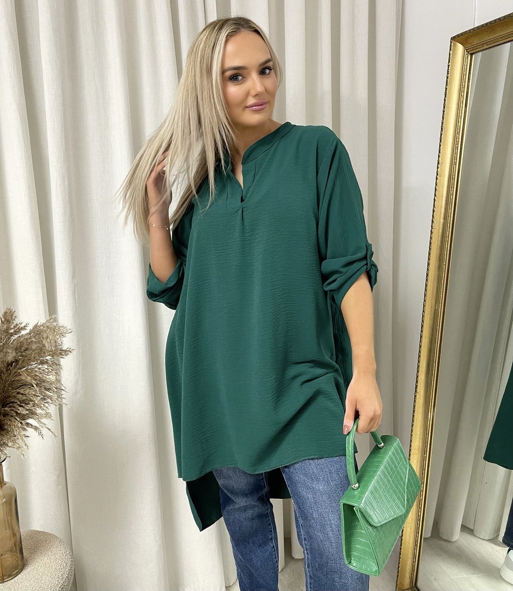 Loose-fit long-sleeve top in dark green with roll-up sleeves and V neckline