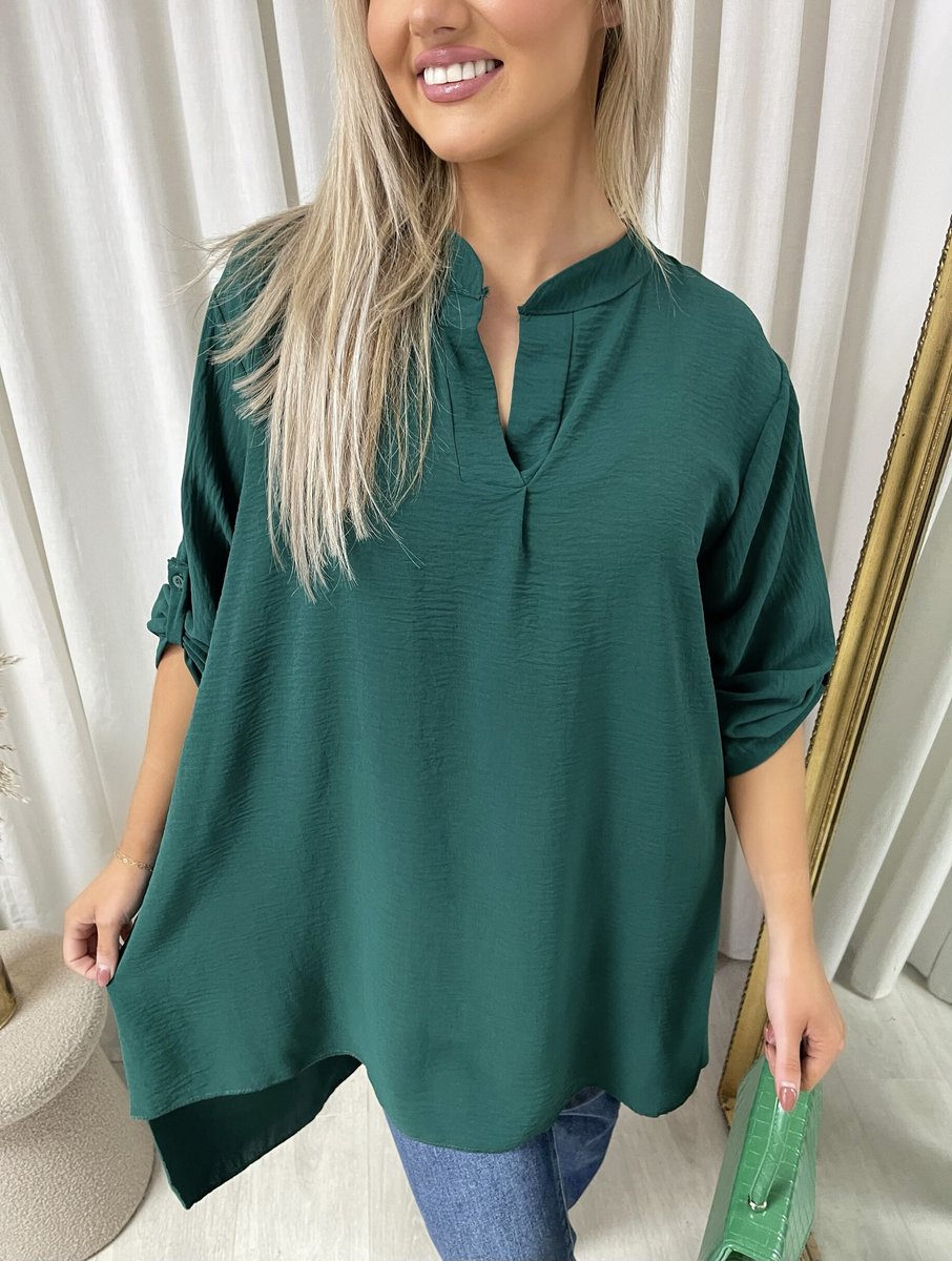 Loose-fit long-sleeve top in dark green with V neckline and roll-up sleeves