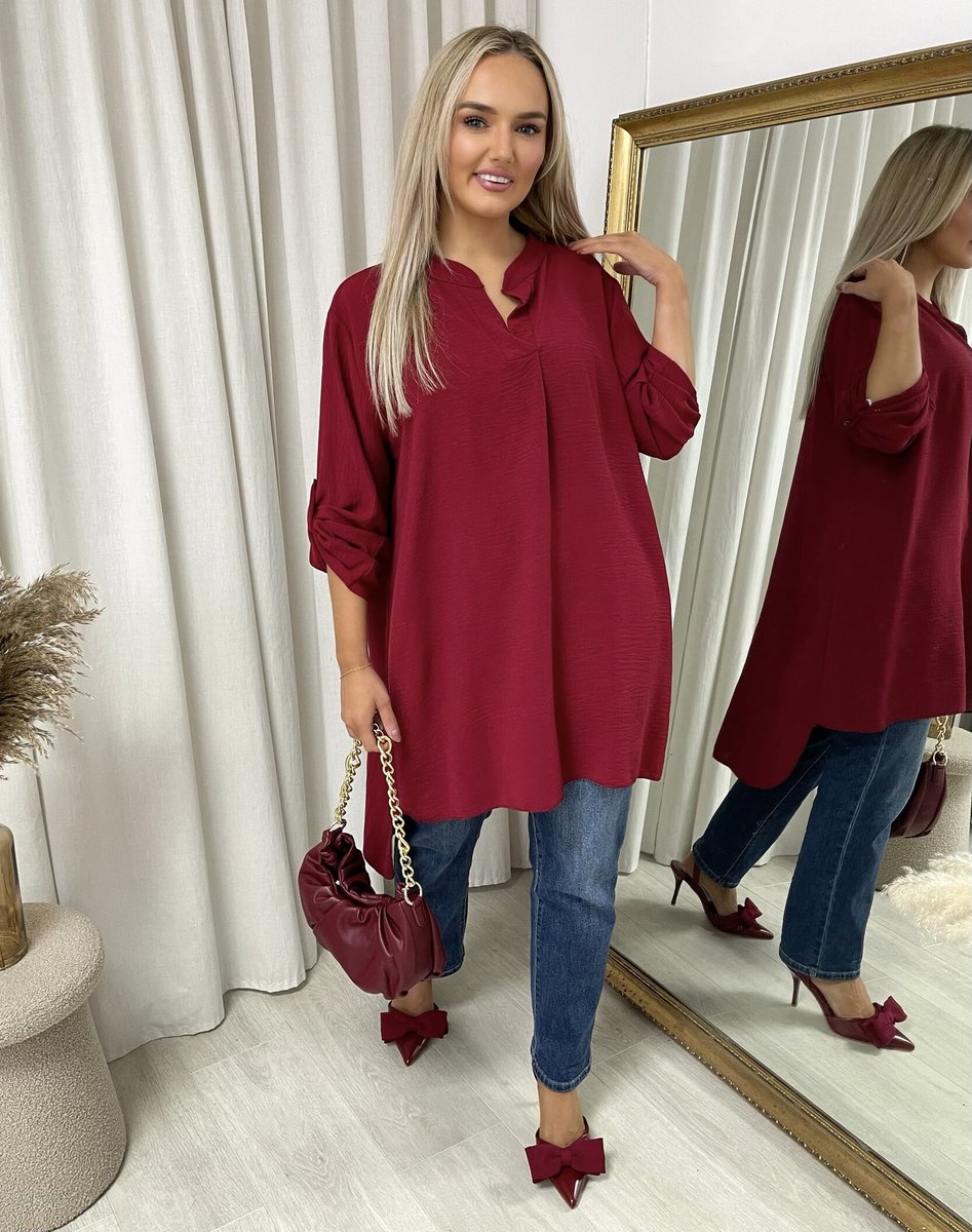 Loose-fit long-sleeve top in wine red with roll-up sleeves and V neckline