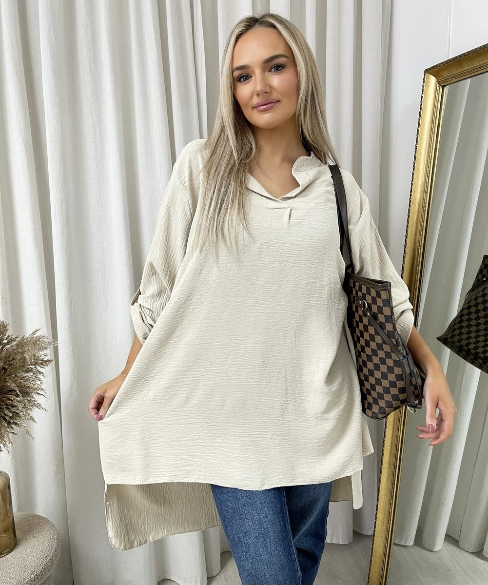 Loose-fit roll-up sleeve top with long back, cream