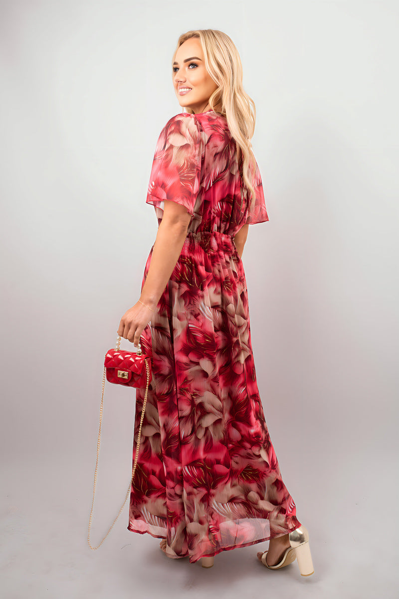 Floral wrap maxi dress, pink and dark red print, short flutter sleeves, side view