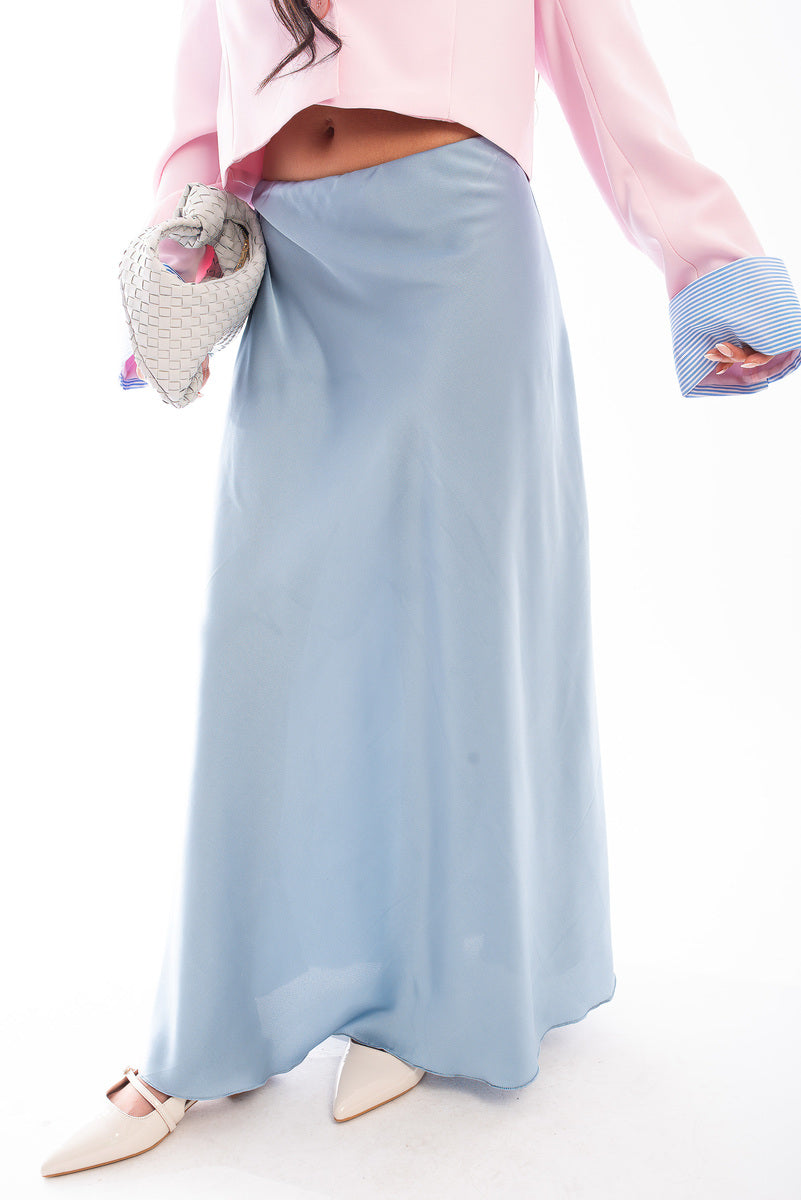 Light blue high-waisted maxi skirt with smooth fabric and full-length hem
