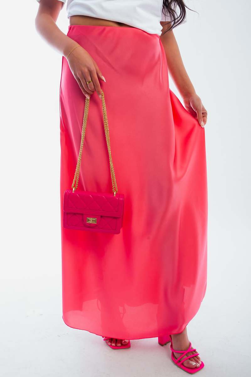 Red high-waisted maxi skirt with flowing lightweight fabric