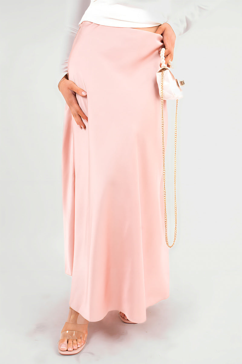 High waisted maxi skirt, lightweight blush pink with smooth drape and long flared hem