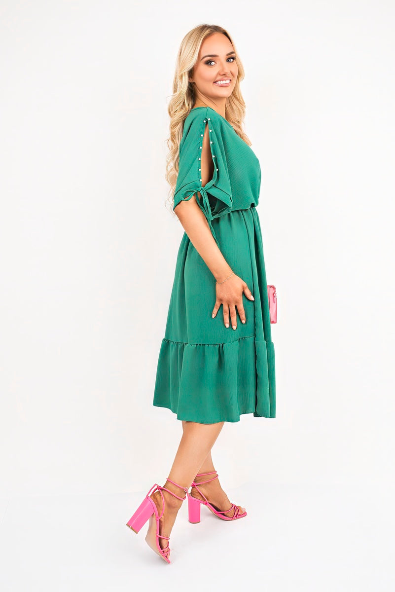 Green round-neck midi dress with short tie sleeves and tiered skirt, side view