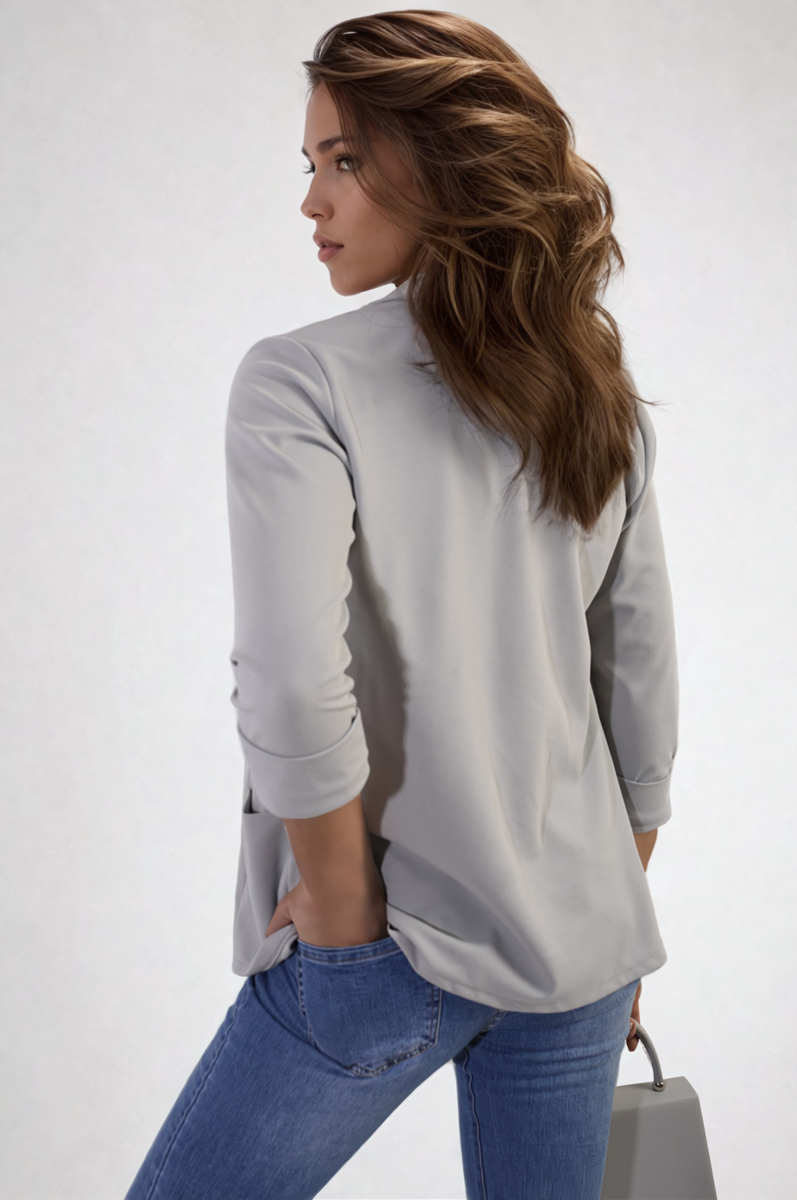 "Open front cardigan with cozy design and front pockets, perfect for versatile and stylish wear."
