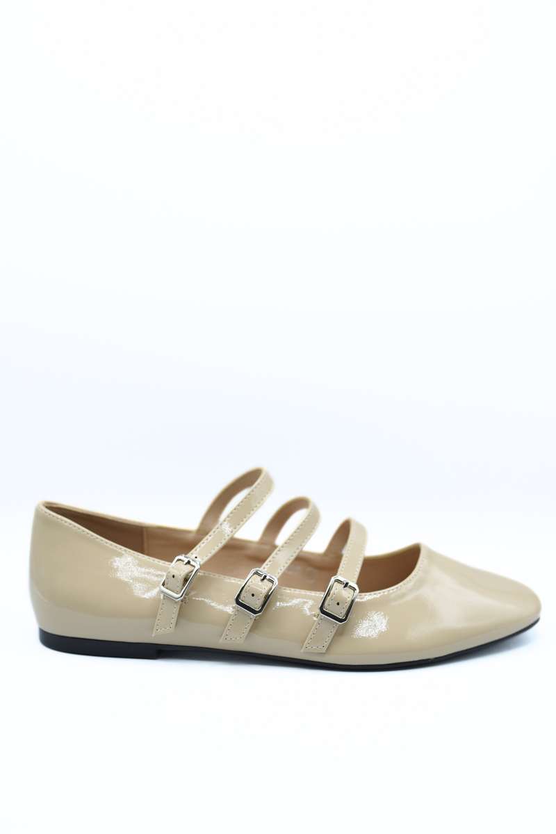 Beige strappy flat shoes with three buckle straps, smooth finish, shown on white