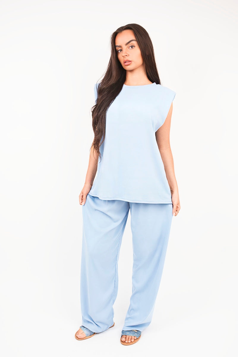 Light blue sleeveless relaxed top and wide-leg trousers set