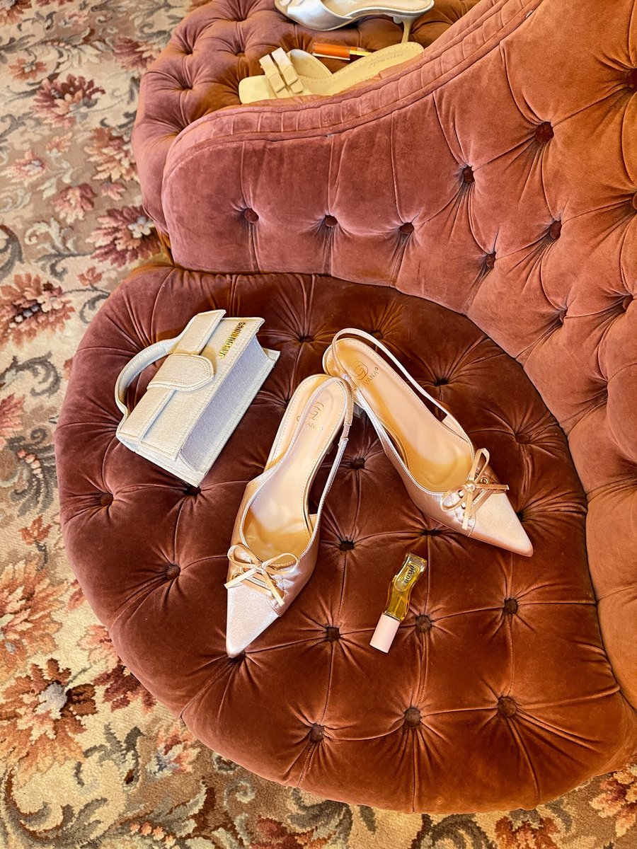 Beige sling back high heels with pointed toe and bow-knot detail
