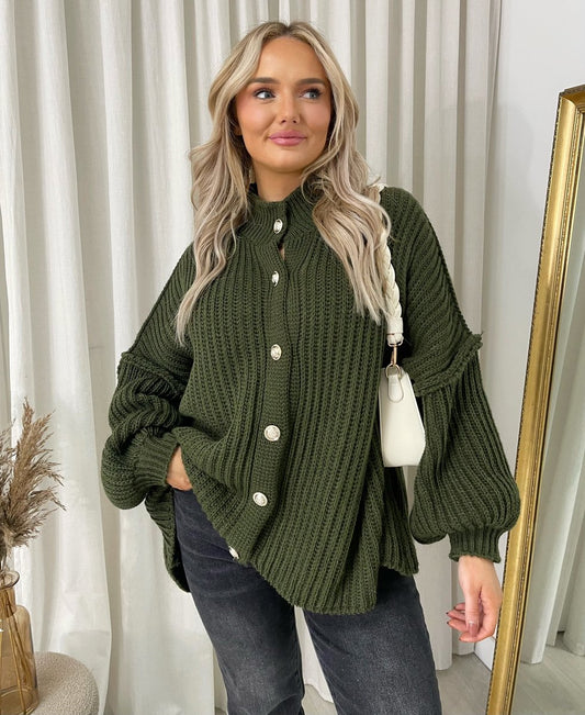 "Oversized green chunky knitted top with a relaxed fit, crafted from premium knit fabric for a cozy and stylish look."