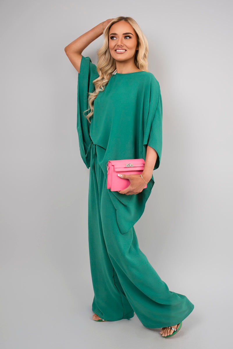 Green batwing top and drawstring wide-leg trousers co-ord set, draped top front