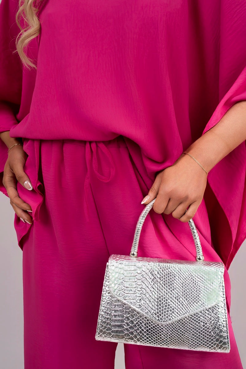 Fuchsia wide-leg trousers with drawstring waist and draped fabric, part of set