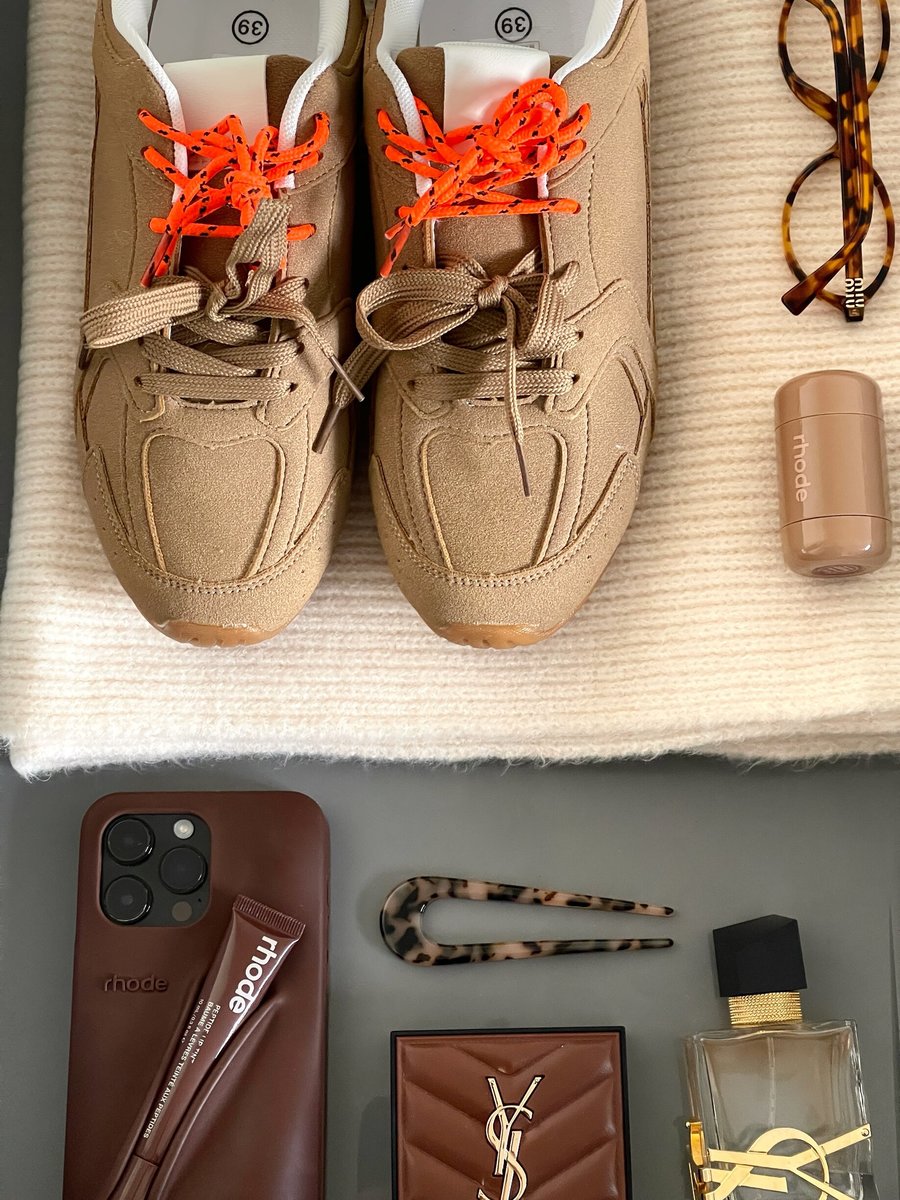 Camel lace-up flat trainers with orange laces and padded tongue