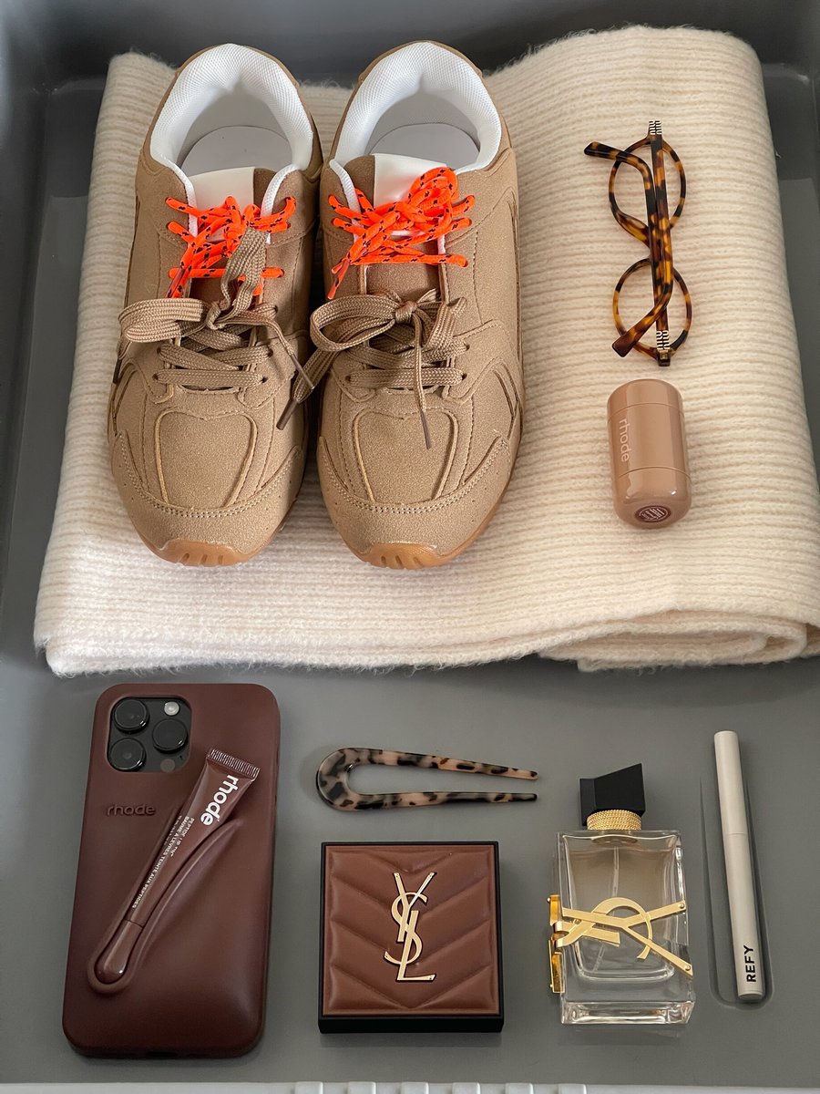 Camel lace-up flat trainers with orange laces and white toe lining