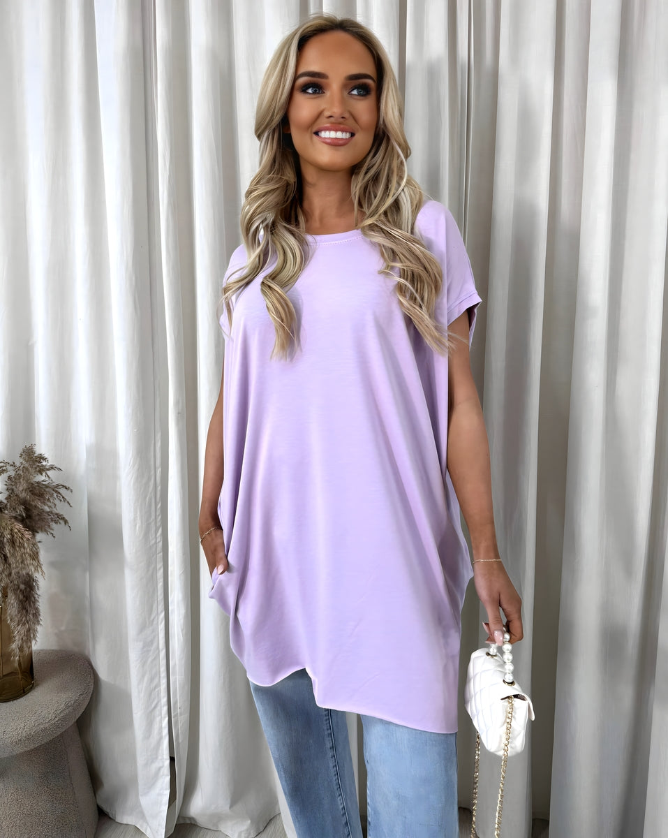 Lilac oversized round-neck top with side pockets and short sleeves