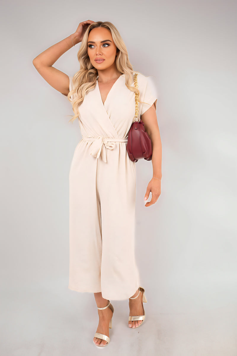 Ivory wrap jumpsuit with short sleeves and tie waist, wide-leg cropped length