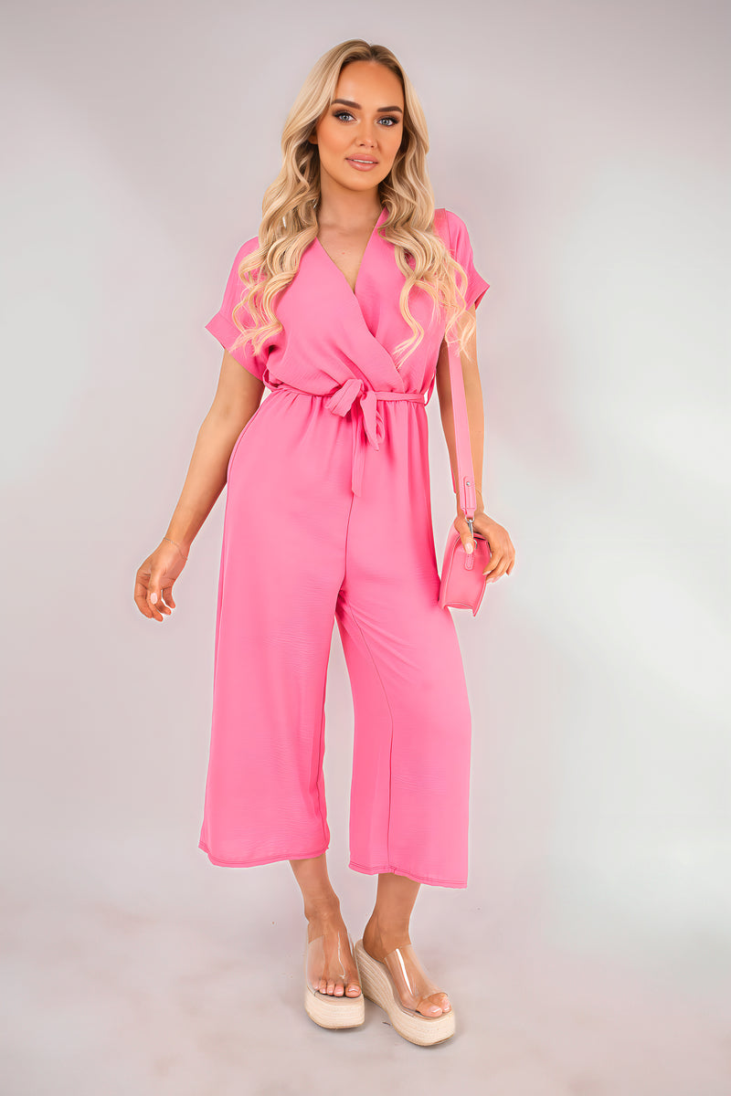 Pink wrap short-sleeve jumpsuit with tie waist and wide-leg cropped pants