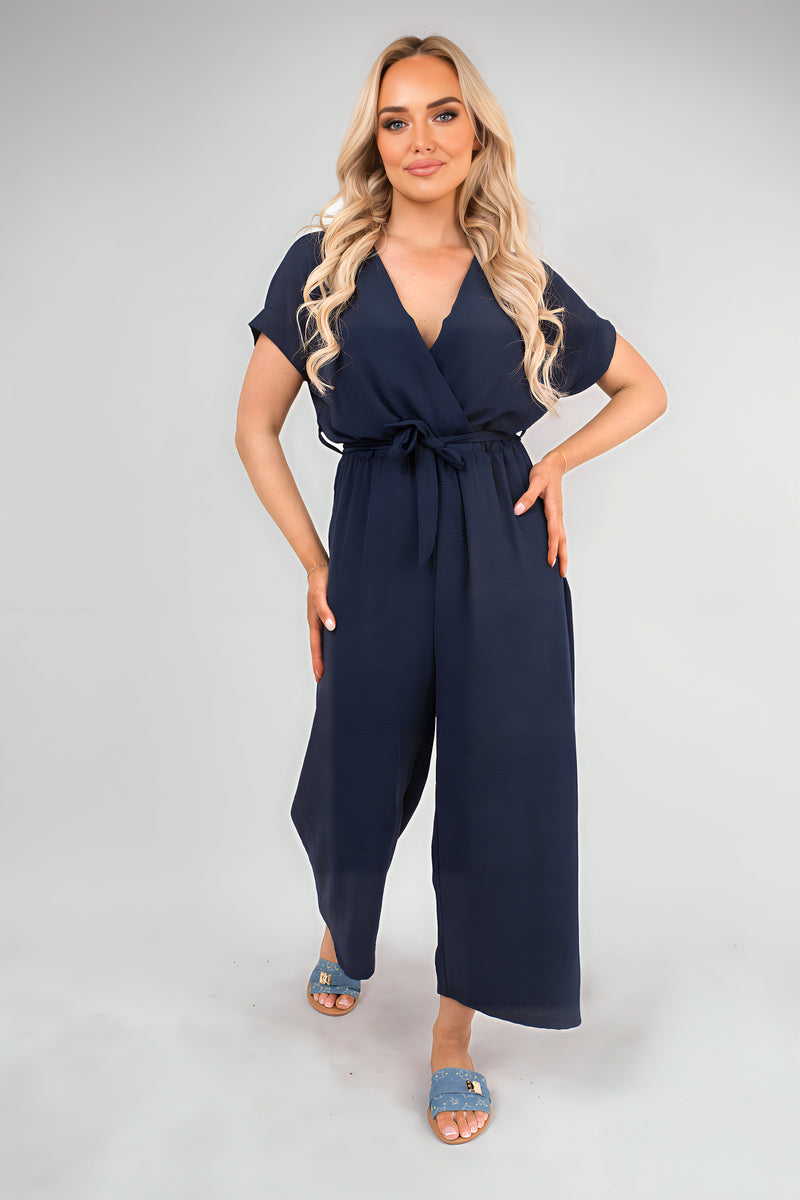 Navy wrap short-sleeve jumpsuit with tie waist and wide-leg cropped pants