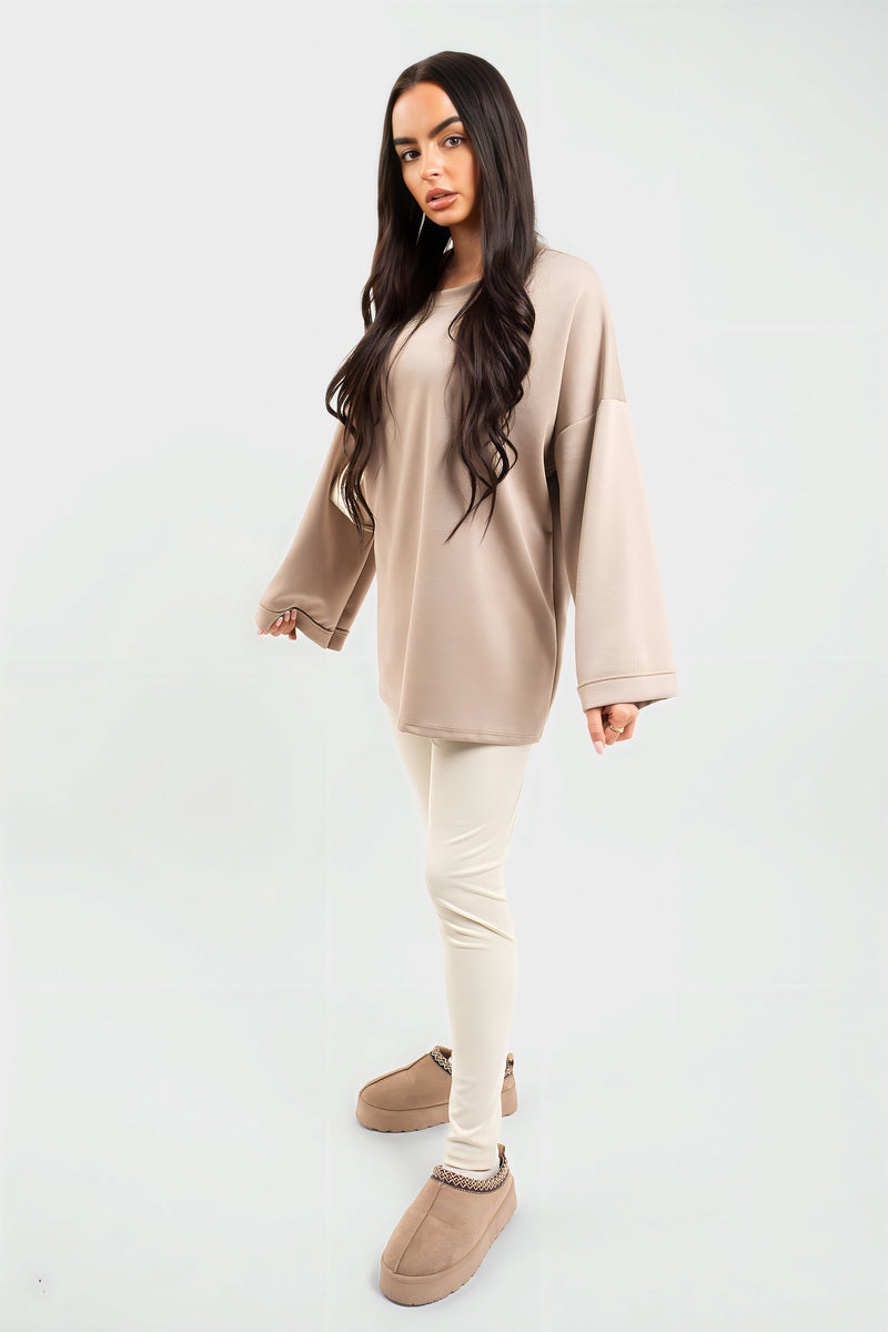 Oversized long-sleeve sweatshirt top, beige, crew neckline and oversized sleeves.