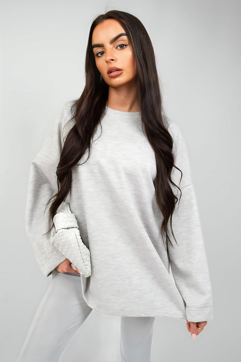Oversized long-sleeve sweatshirt top, light grey, crew neck with dropped shoulders.