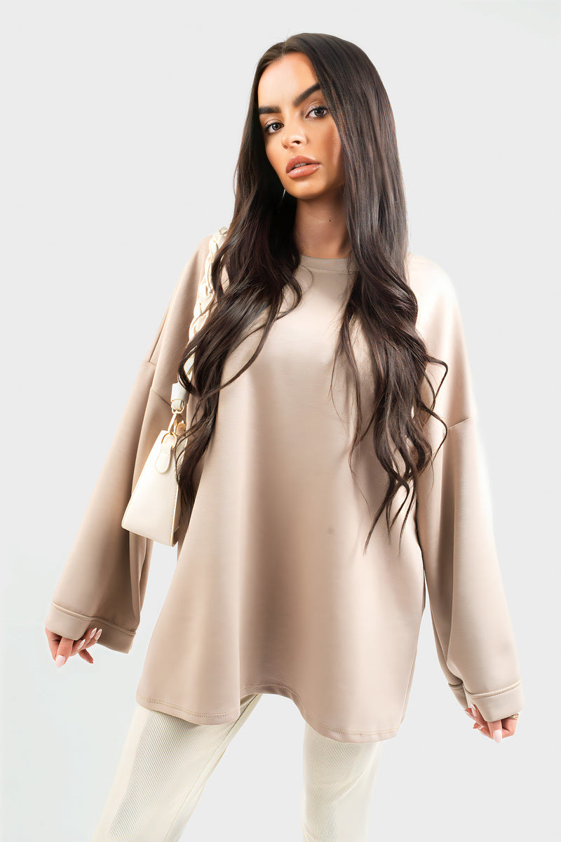 Oversized long-sleeve sweatshirt top, beige, loose fit and wide long sleeves.