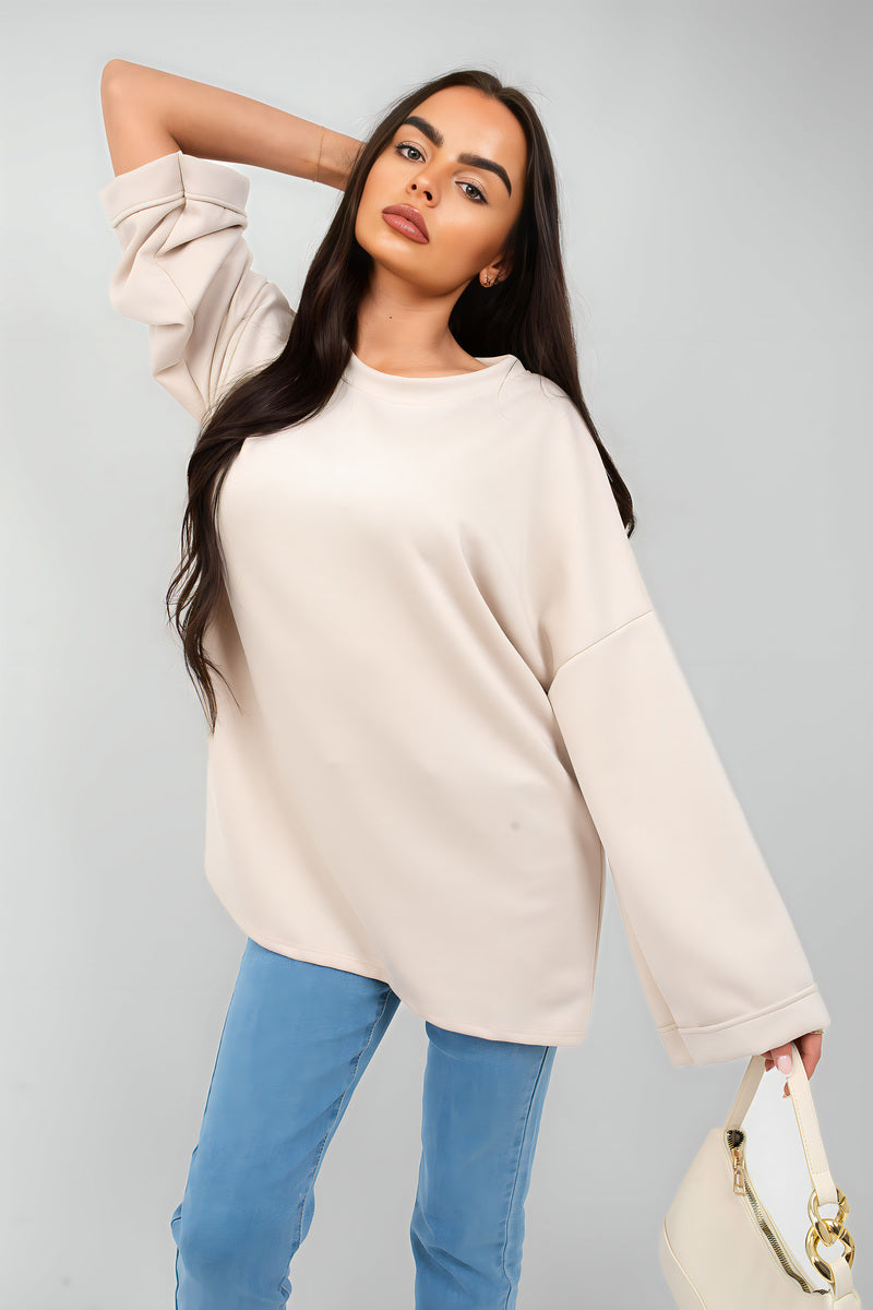 Oversized long-sleeve sweatshirt top, light beige, crew neck with roomy fit.