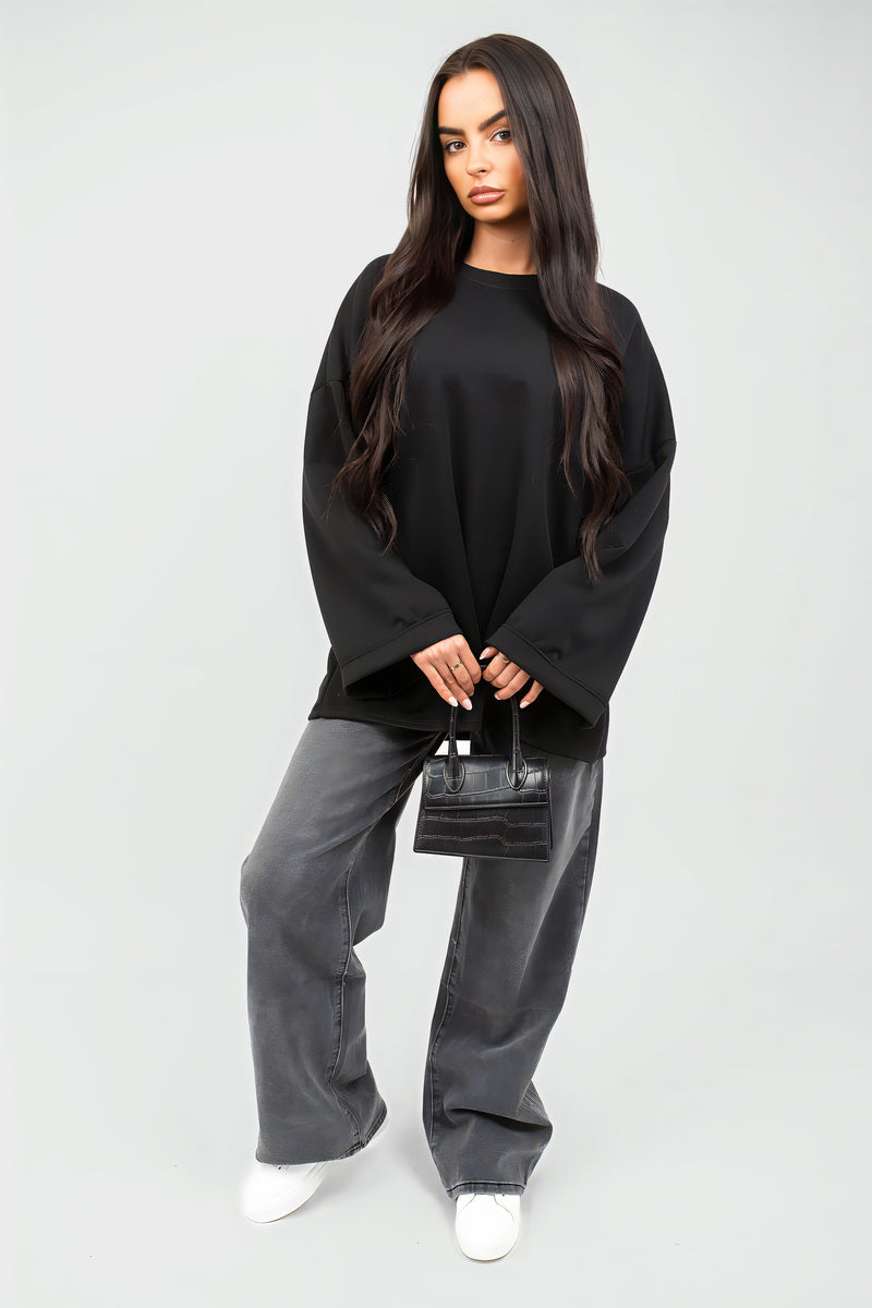 Black oversized long-sleeve sweatshirt with dropped shoulders