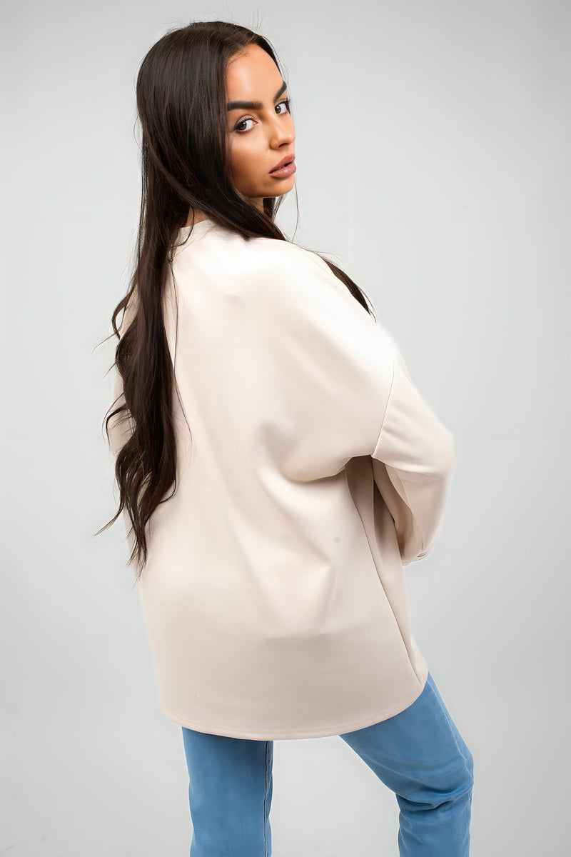 Cream oversized long-sleeve sweatshirt with wide loose fit
