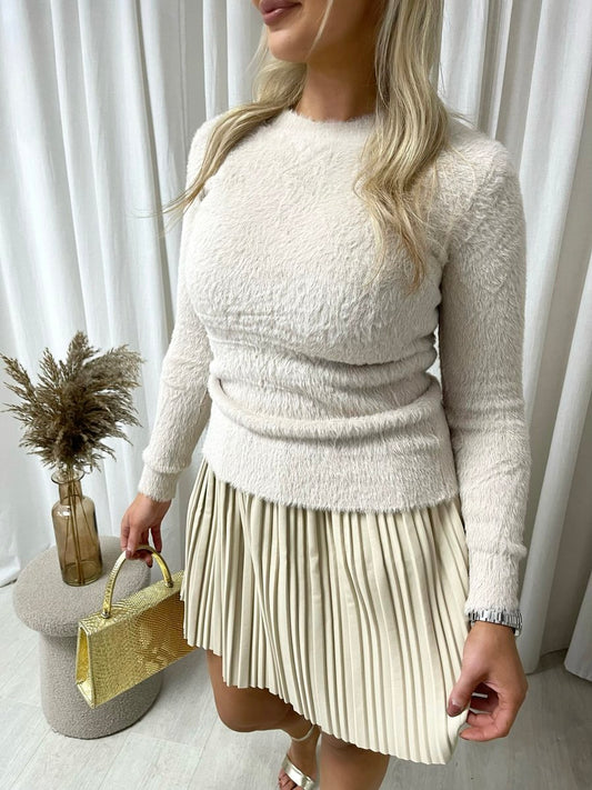"Fitted long sleeve fluffy knitted top in beige, perfect for winter layering and cozy wear."