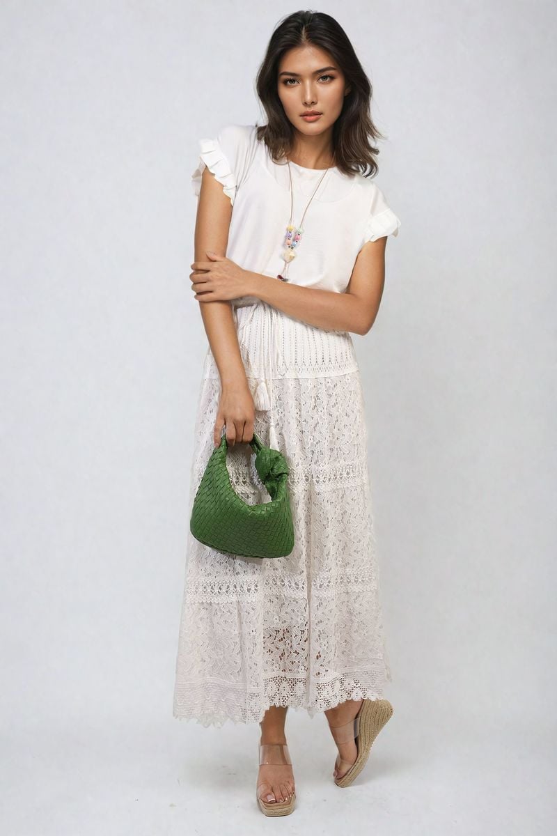 White ruffle-trim sleeve top with round neck and layered shoulder ruffles