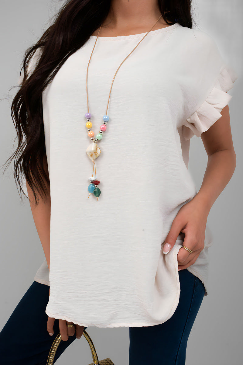 White ruffle-trim sleeve top with crew neckline and side drape