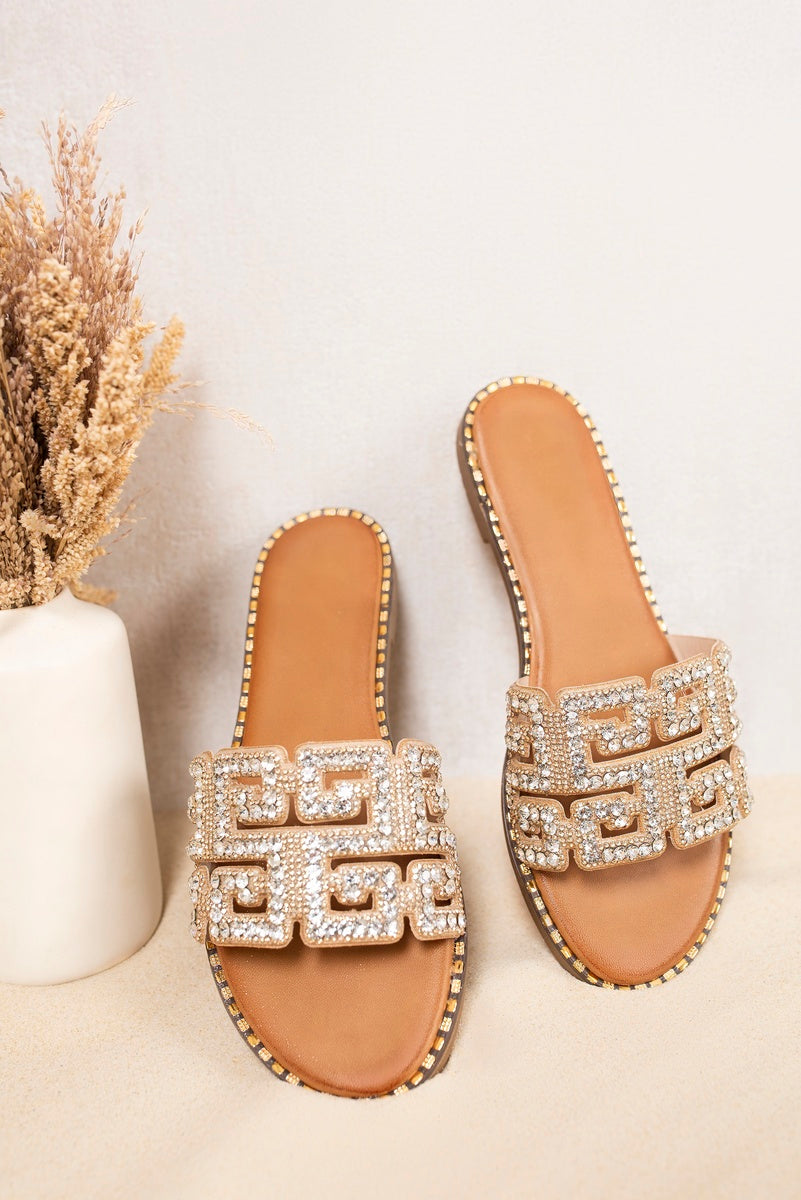 Silver diamante slide sandals pair with open toes and Grecian strap detail