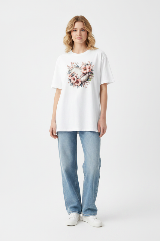 Floral Heart Graphic T-Shirt worn by female model in white studio — editorial full body shot showing relaxed oversized fit