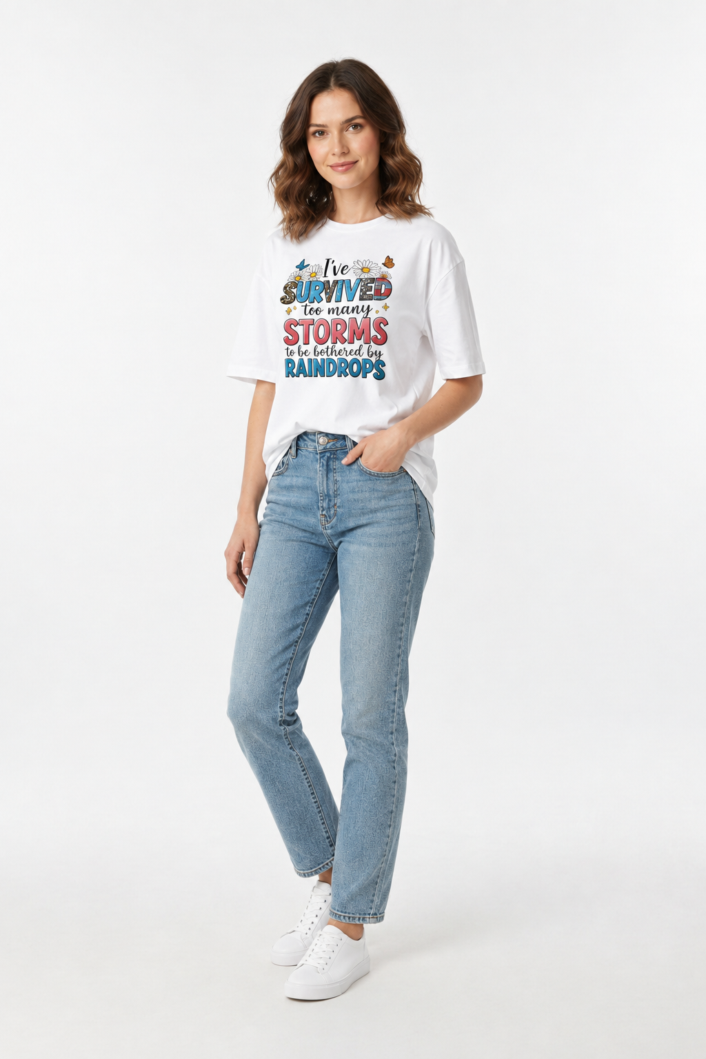 White crewneck T-shirt with rainbow storm-themed text and raindrop illustration