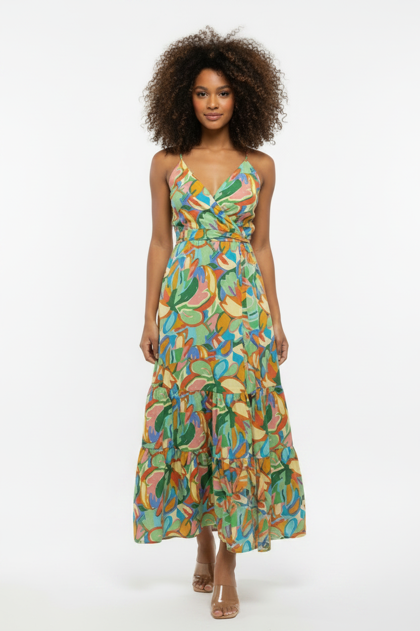 Front view tiered wrap maxi dress with multicolored leaf print and thin shoulder straps
