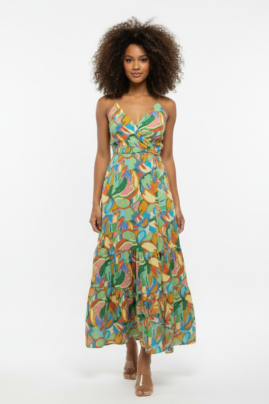 Front view tiered wrap maxi dress with multicolored leaf print and thin shoulder straps